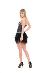 Fototapeta premium Blond girl in a short black skirt