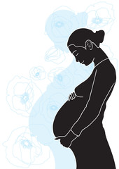 silhouette of expectant mother