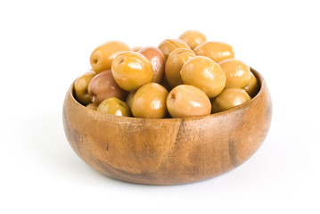 Bowl full of Green Olives on white background