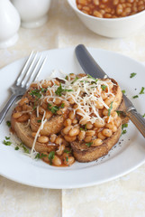 Toast with baked beans and grated cheese