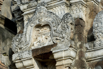 Thai relief art over door at Stu-pa 2.