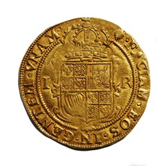 Old British hammered gold coin isolated Unite of James I reverse