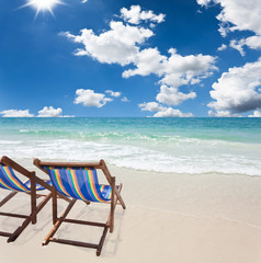 beach chair on white sand
