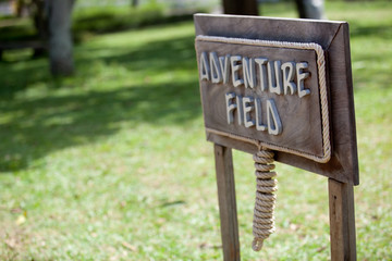 Adventure field wooden sign board