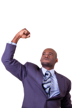 Young Business Man Pumping His Fist In The Air