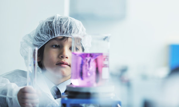 little child scientist in lab