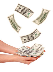 Female hands and falling money