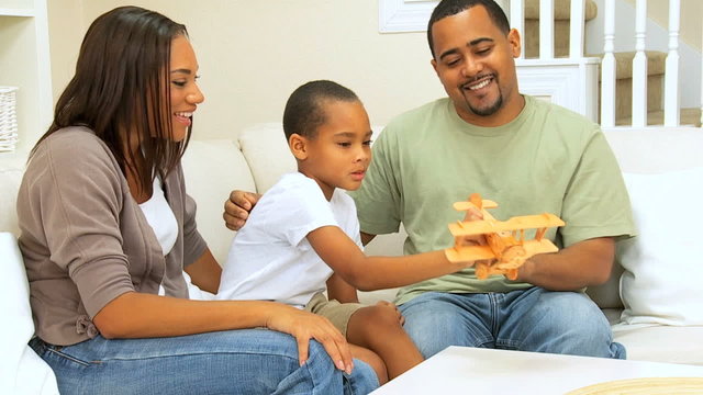 Young African-American Boy Playing with Parents