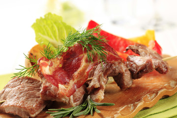 Roasted meat on wooden skewer