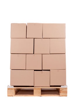 cardboard boxes on wooden palette