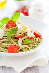 spaghetti with  pesto and tomato