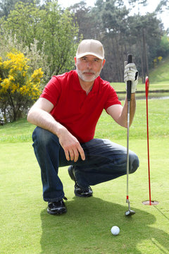 Senior Man On Golf Course