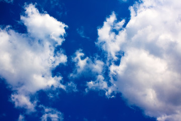 white light, globular clouds, bright blue sky