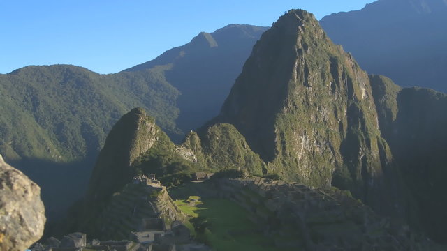 Time lapse sunrise over ruins of Machu Picchu in Peru