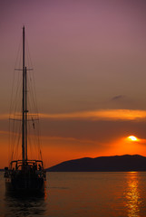 Fototapeta premium Sailboat and sunset