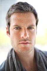 Fototapeta premium Close-up portrait of a handsome man