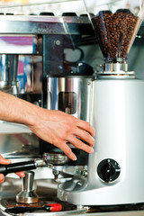 Barista prepares espresso