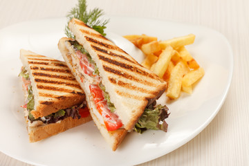 Sandwiches with French fried potatoes