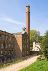 Fototapeta premium Old cotton mill by path
