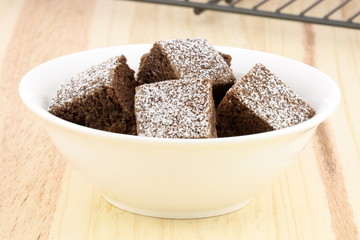 chocolate brownies with powdered sugar on top