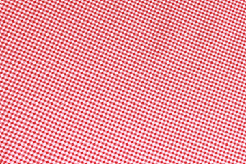 Red and white gingham patterned fabric background