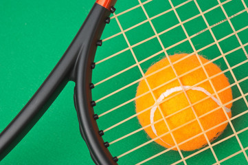 tennis racket and a ball