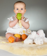 Young cute baby in an easter setting