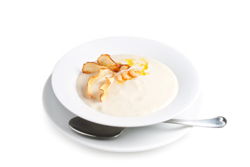 Cream soup with chips and shrimps
