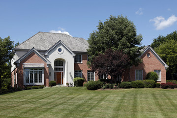 Large home with arched entry
