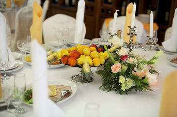 accent of fruits and flowers on the table