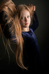 Fine art portrait of a dreaming beautiful little girl