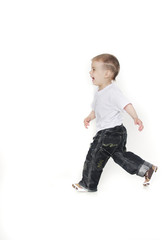 happy boy running over white