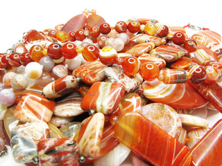 heap of red semiprecious beads