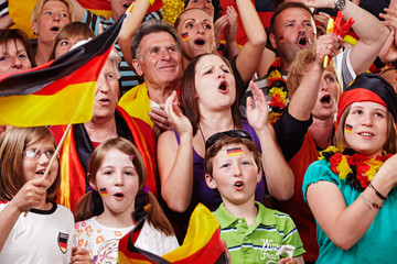 Fototapeta premium young and aged german soccer fans