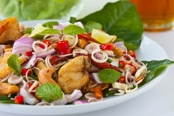 Herb salad with deep fried fish  (Thai food)