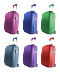 Different colored suitcases isolated on white background
