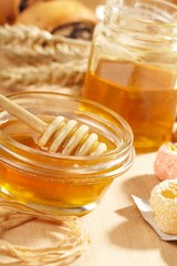 Honey with wood stick