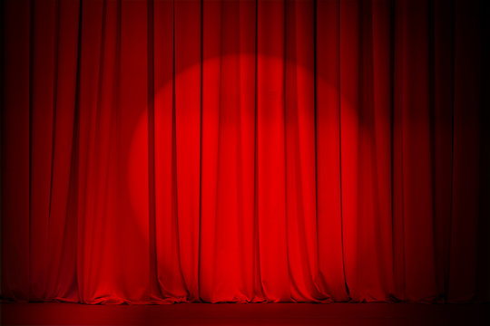 theatre red curtain with spotlight