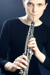 Oboe musical instrument playing oboist