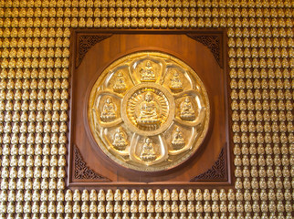 The circle of golden buddha & small buddha Statue