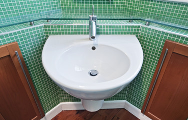 bathroom with green mosaic tiles