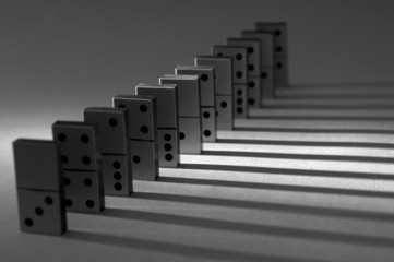 Black and white dominos with shadows