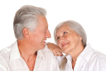 elderly couple  on a white