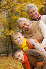 Fototapeta premium family of four on the nature