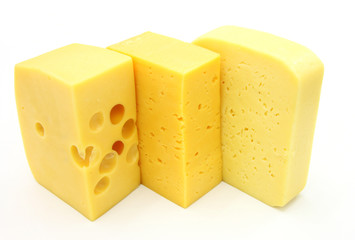 three pieces of different kinds of cheese
