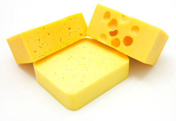 three pieces of different kinds of cheese