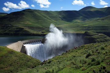 Mist rising above the Katse dam wall in Lesotho - obrazy, fototapety, plakaty