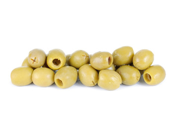 Some green pitted olives isolated on the white background