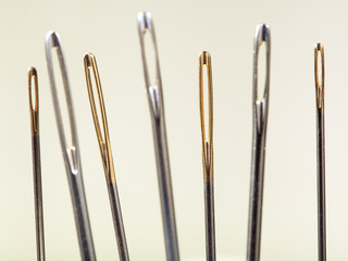 needle's eyes with yellow background