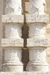 Part of the old buildings in the form of 2 columns, cracked
